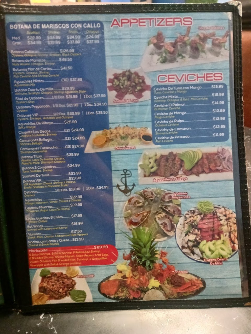 Restaurant menu featuring seafood dishes and sides.